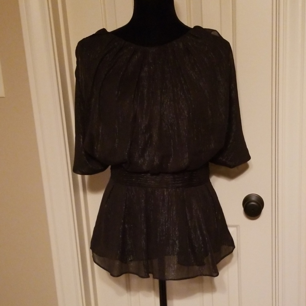 Black lined blouse with silvery sparkle.